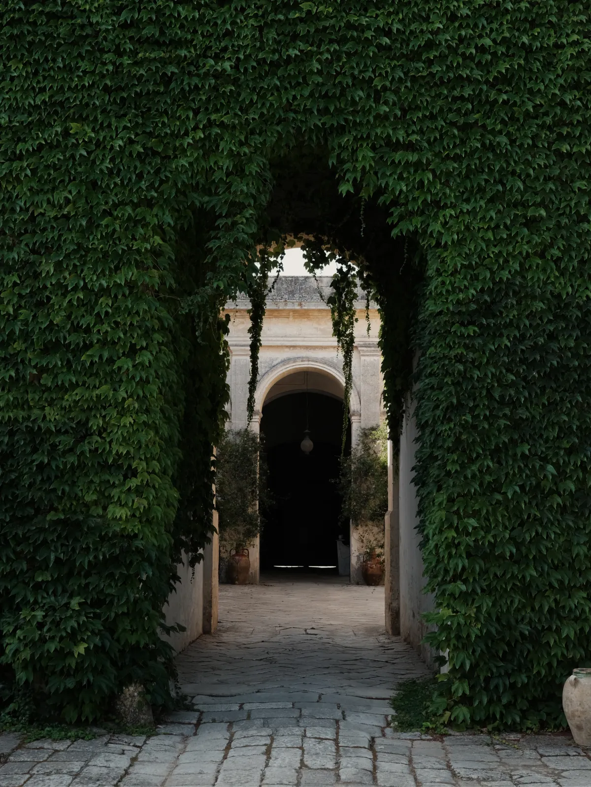 An arched hallway inside Palazzo Daniele.